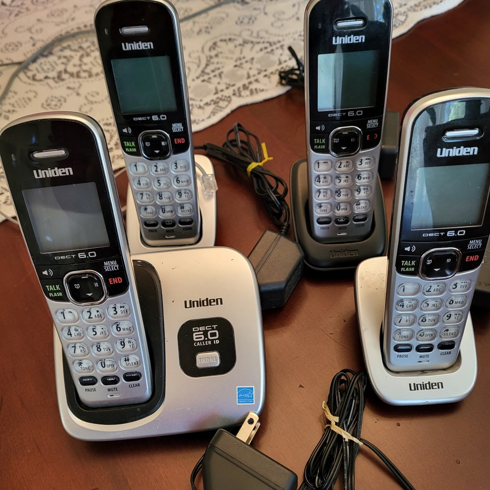 Uniden Silver Cordless Phone Set four units.